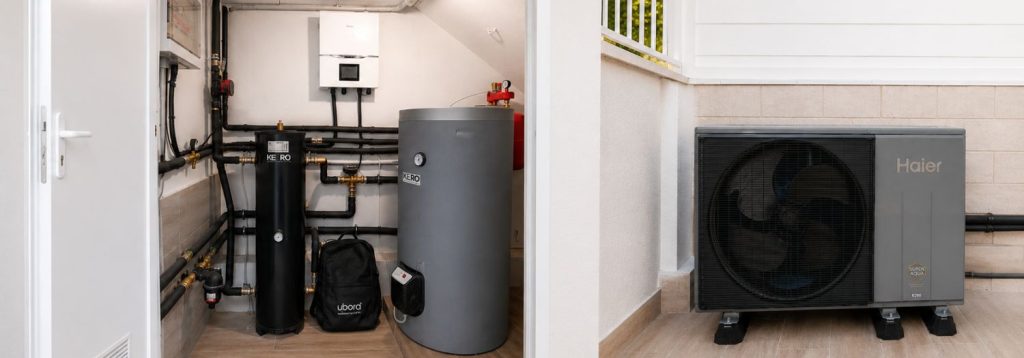 Instalación de aerotermia Haier con depósito de inercia, acumulador de ACS y unidad exterior en una vivienda de Madrid